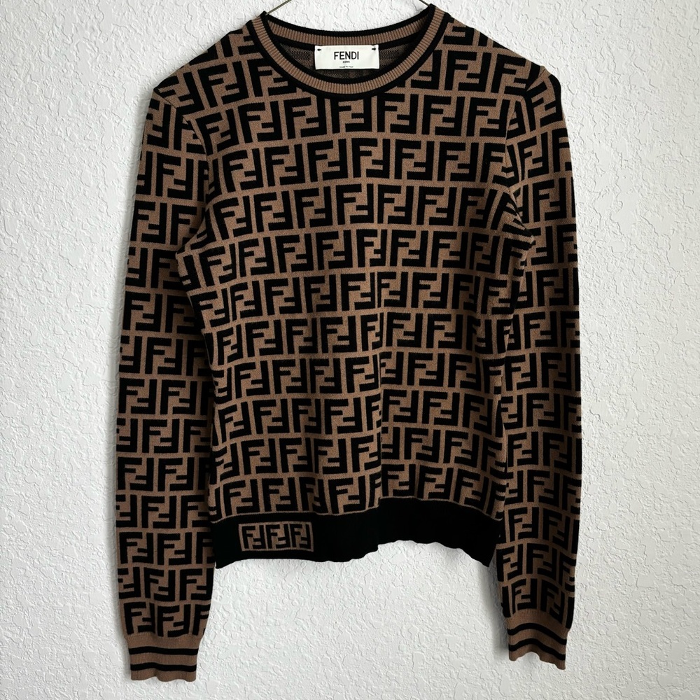 FENI sweater gently used. Black and brown colors. Size 38.